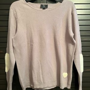 New without tags. The color is a pretty very very light purple